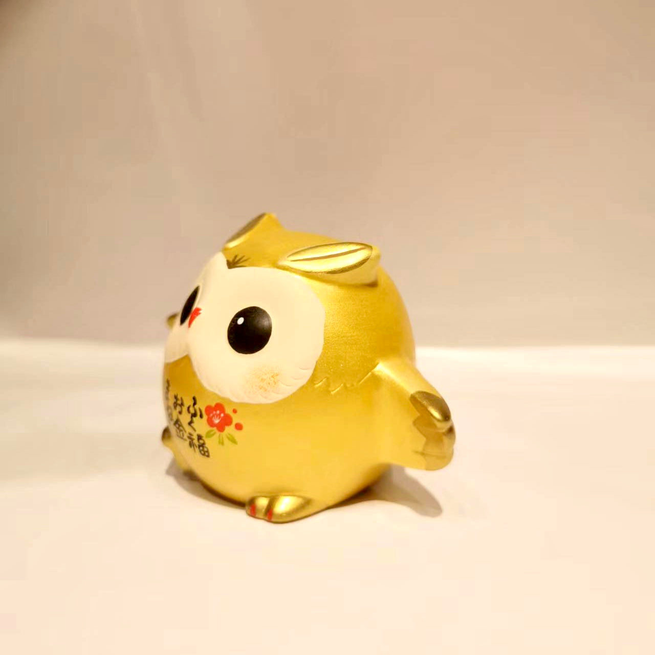910312 Golden owl