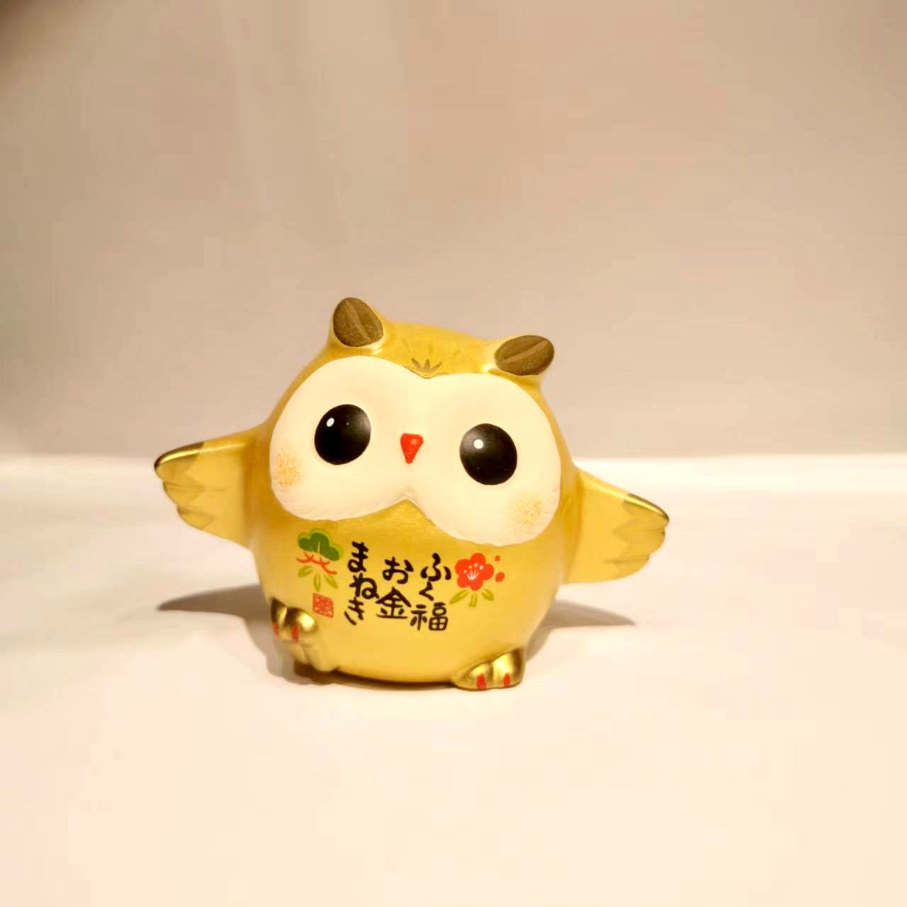 910312 Golden owl